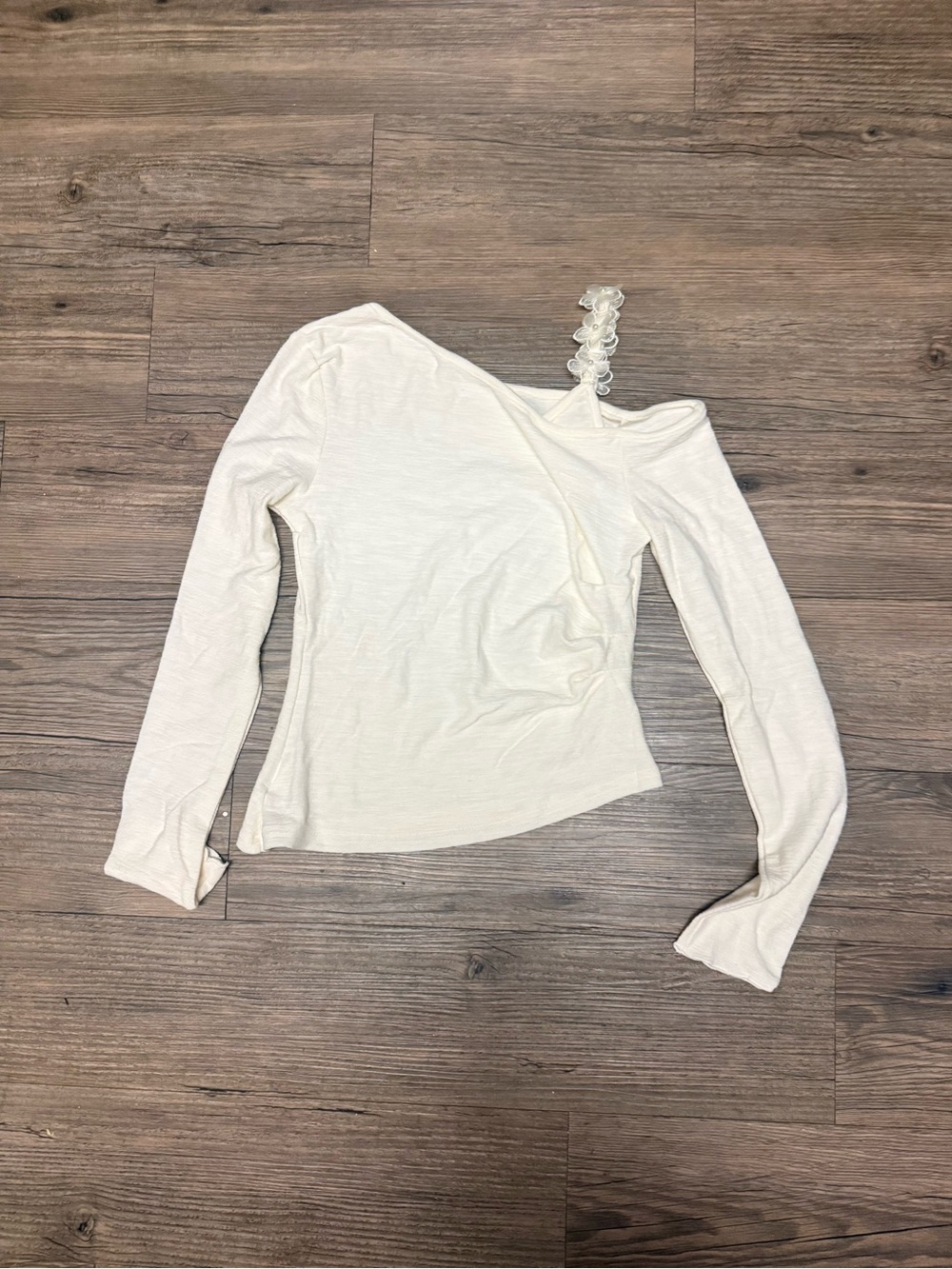 One-Shoulder Long Sleeve Top with Decorative Strap in Cream